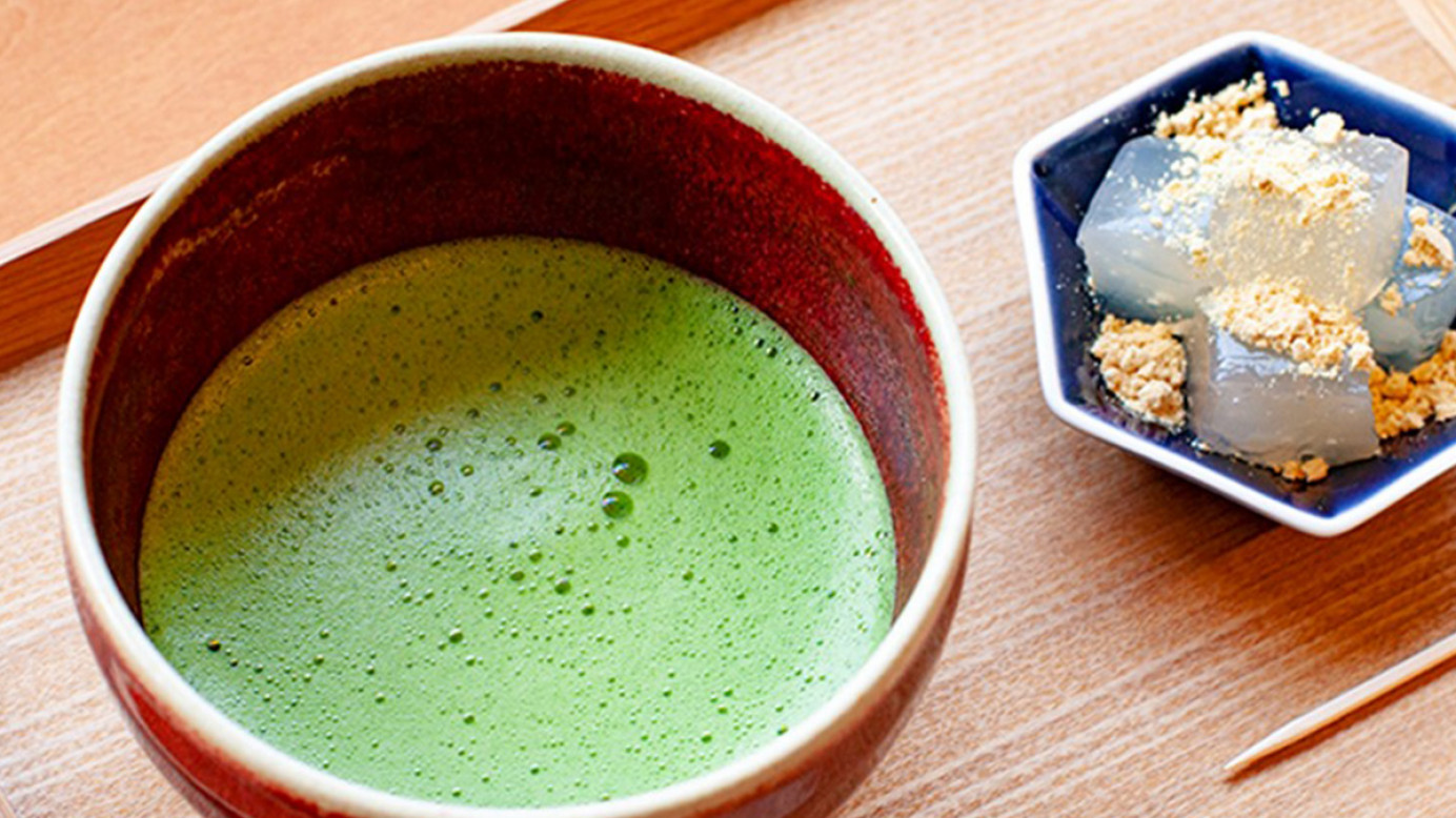 A fresh cup of frothy green tea.